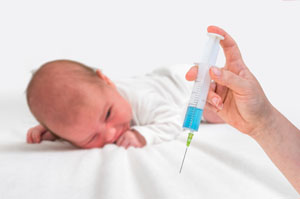 bigstock Doctor Holds Syringe To Vaccin 267743236 SM