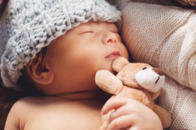 bigstock Newborn Baby Boy In A Basket 168539576